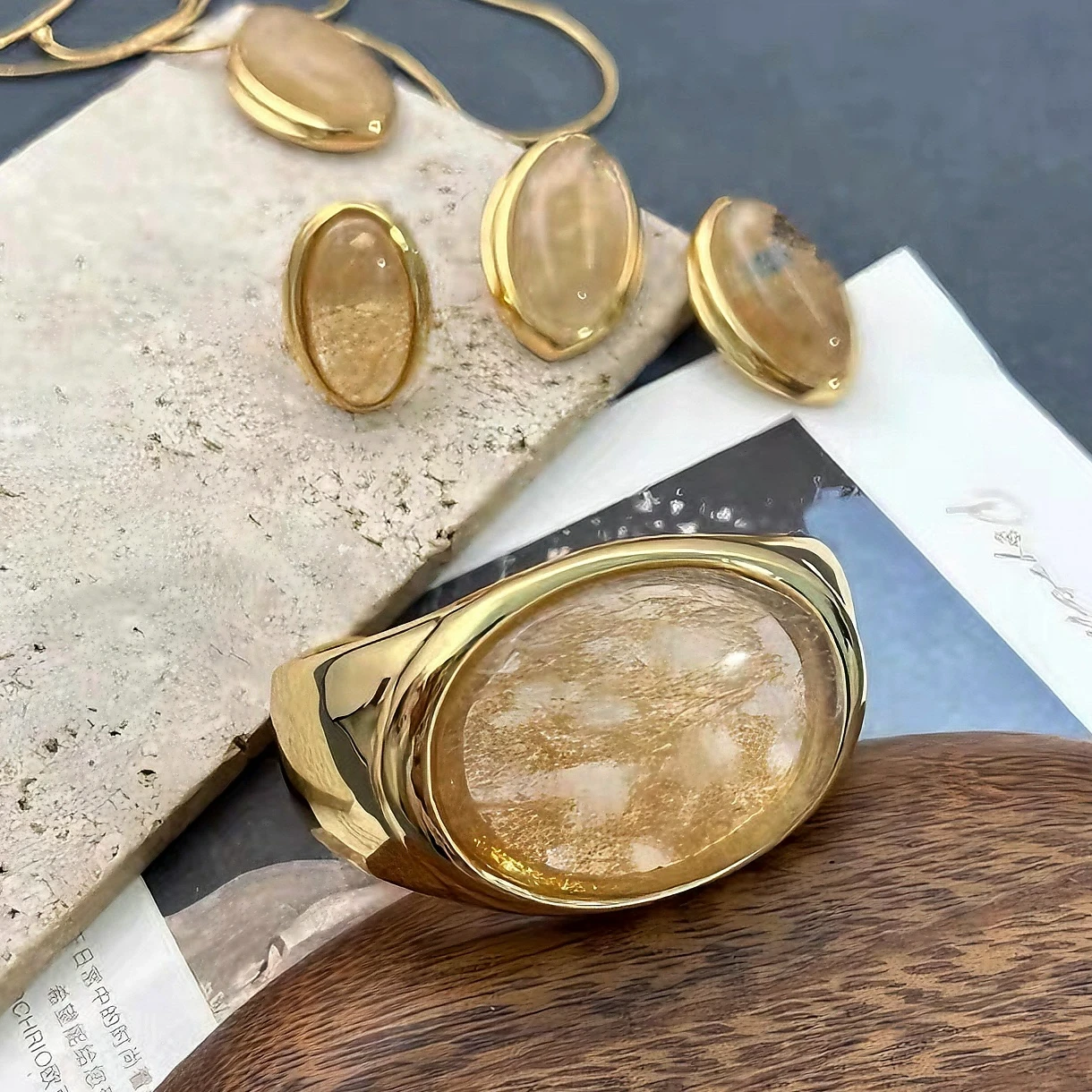 Open Gold Oval Gemstone Bracelet