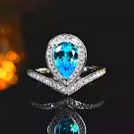 Princess Crown 2ct Pear Blue Topaz Ring