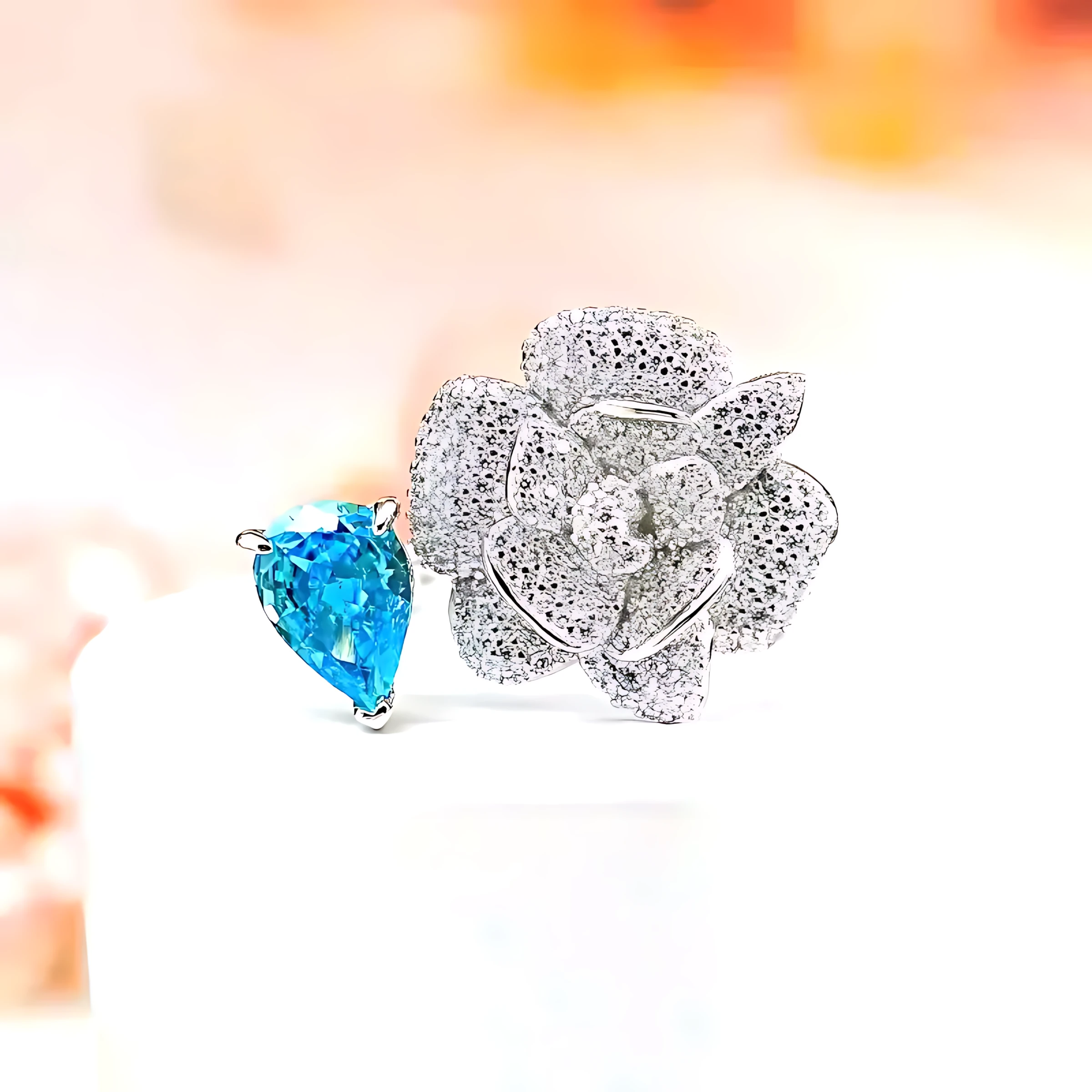 Open Camellia 3ct Pear Blue Topaz Ring