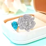 Open Camellia 3ct Pear Blue Topaz Ring