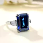 Three Stone 10ct Emerald Cut Sapphire Ring