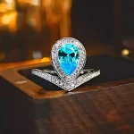 Princess Crown 2ct Pear Blue Topaz Ring